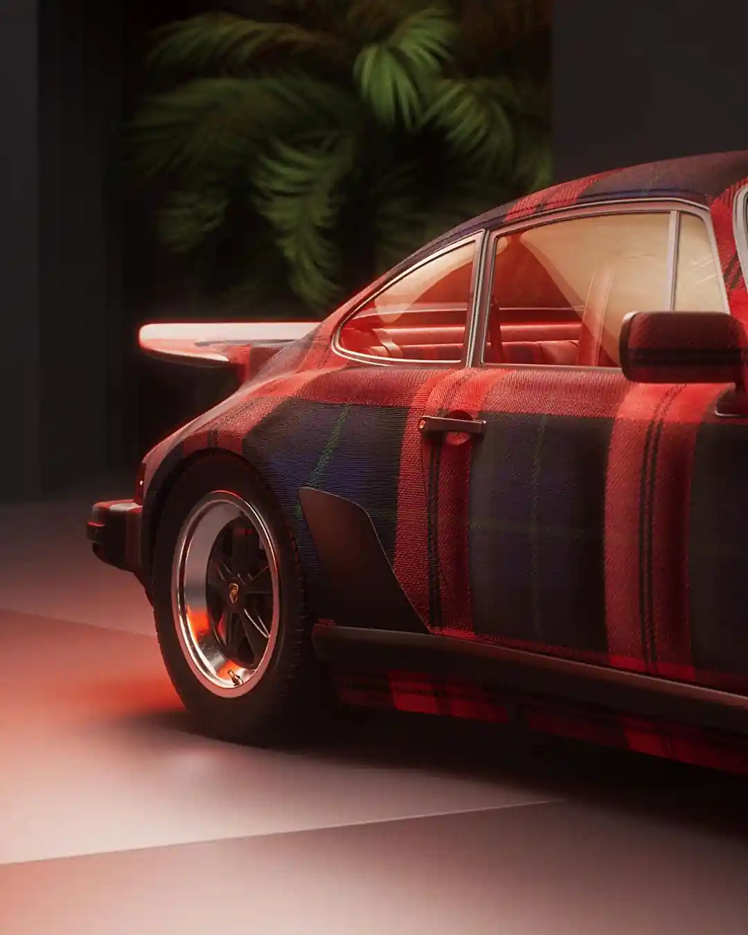 Porsche tartan parça üçün tarixi debütü
1973-cü ildə Frankfurtda keçirilən Beynəlxalq Avtomobil Sərgisində (IAA) Porsche şirkəti 911 RSR Turbo konsept avtomobilini nümayiş etdirdi ki, bu avtomobildə Qara Saat tartanından ilhamlanaraq mavi, yaşıl və qara naxışda üzlük parça var idi. Tezliklə kolleksiyaya daha iki naxış əlavə edildi: qalın qırmızı və mavi rəngdə McLaughlin (həmçinin MacLachlan kimi tanınır) tartan və bej, qırmızı, mavi, ağ və zeytun yaşılı çalarlarında Mackenzie tartan.