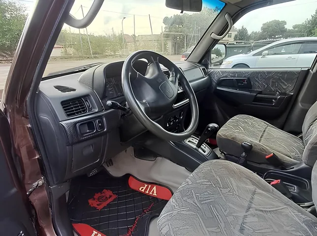 Mitsubishi Pajero io, 1.8 L, 1999 año, 286 000 km, Baku - Precio: 5 200 ₼ - Tunel.az